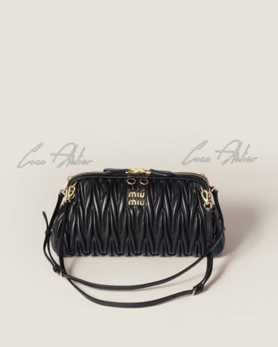 Matelassé Clutch Bag