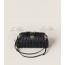 Matelassé Clutch Bag