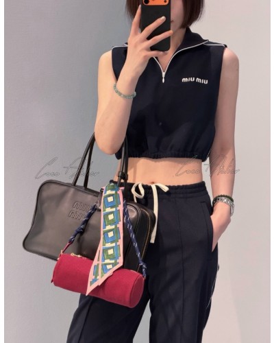 Navy sleeveless zip-up